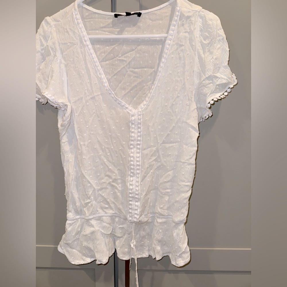 White V-Neck Women's Top. Cinch tie creates illusion of small waist!